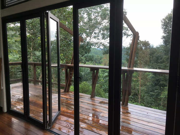 Her favorite part of the house is the balcony, which offers a view of the Malaysian jungle.