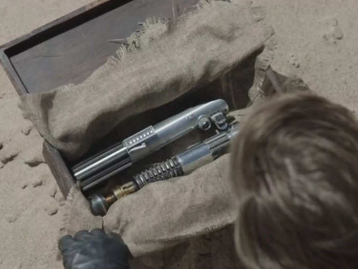 Obi-Wan Kenobi hides lightsabers in the sand similar to Rey in "The Rise of Skywalker."