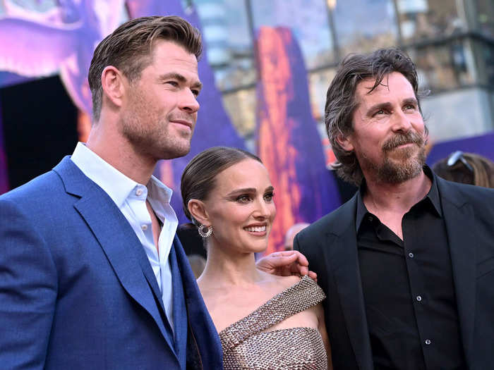 Hemsworth, Portman, and Bale all posed together.
