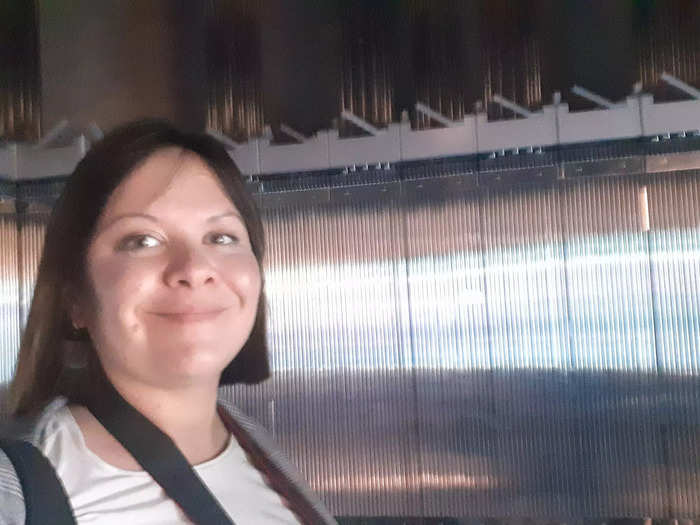 The rods spent their working life stacked by the thousand in a reactor core, making heat that will be turned into electricity. This is me in a (replica!) reactor, with a wall of rods behind.