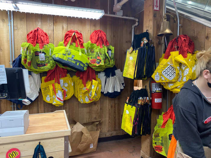 The wall behind the register was full of reusable Trader Joe’s bags that were available for purchase.