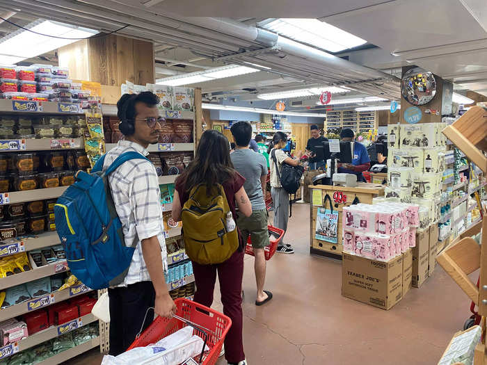 After I finished shopping, I joined the long line of customers waiting to check out.