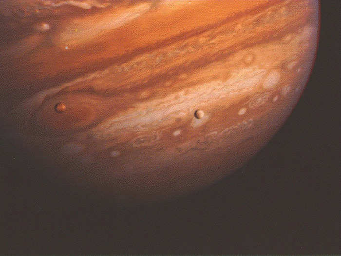 The probes discovered two new moons orbiting Jupiter: Thebe and Metis....