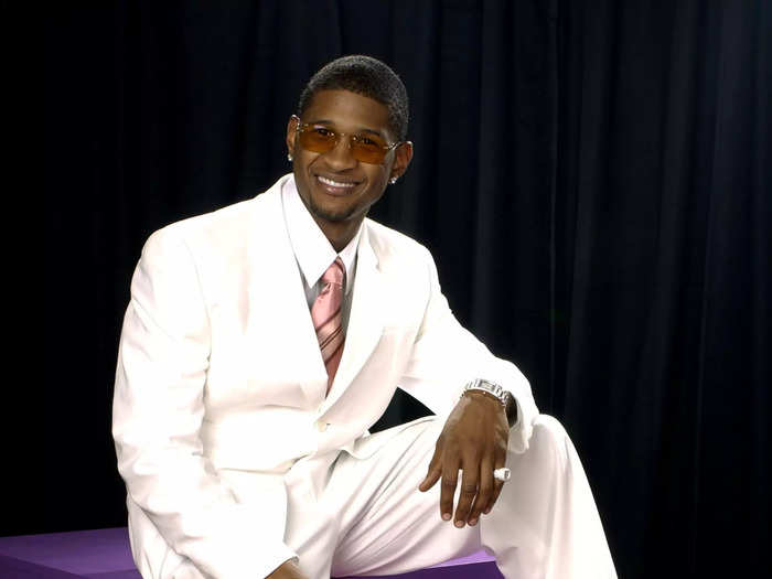 Usher wore an all-white suit and a pair of sunglasses that did not go with the look for the second-ever BET Awards in 2002.