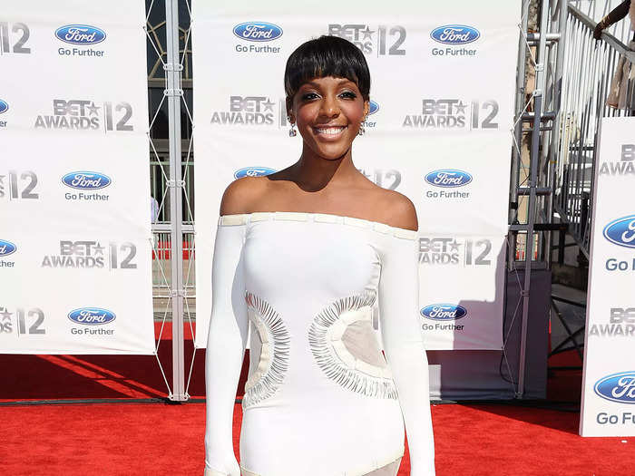 At the 2013 BET Awards, Dawn Richards walked the red carpet in a white dress with sheer details.