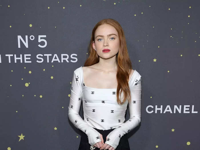 She wore black and white again for a Chanel event in November 2021.