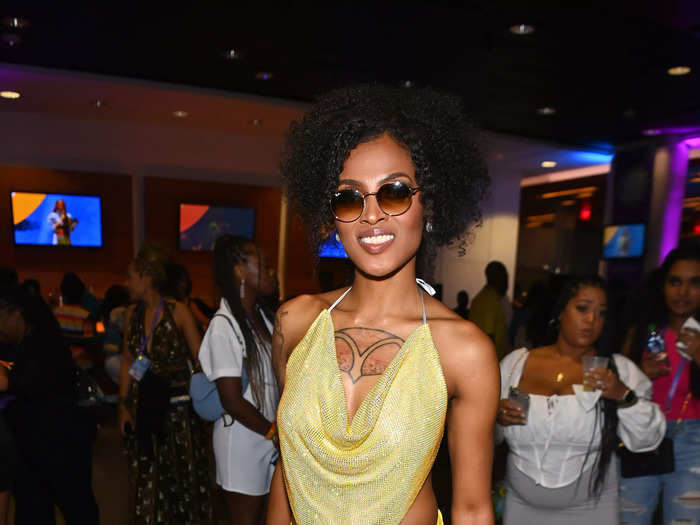 Marquita McSwain donned an all-yellow look featuring a slinky halter top.