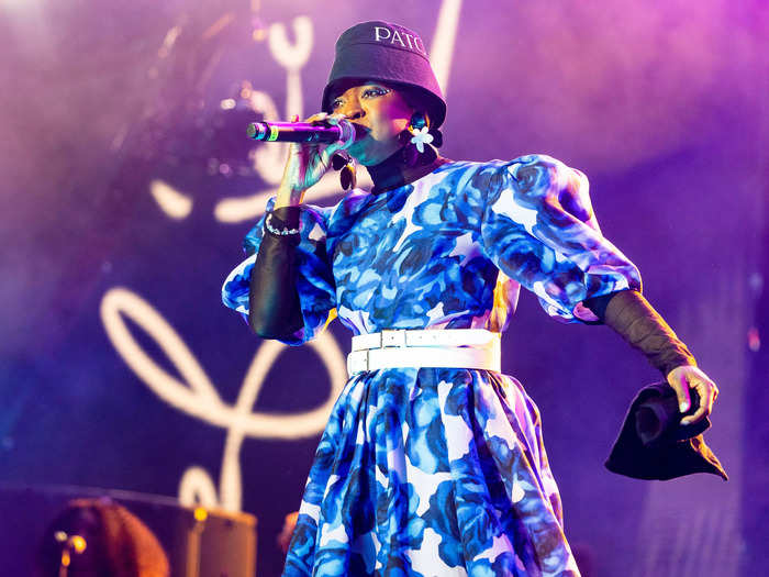 Lauryn Hill looked super cool during her performance in a blue floral dress and bucket hat.