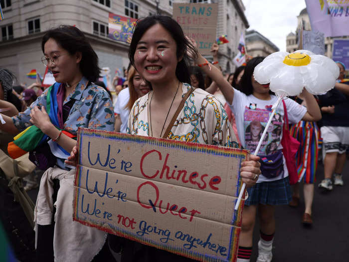 One woman was photographed holding a sign that read: "We