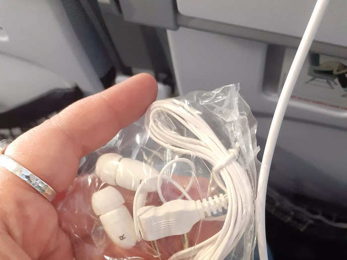 Earphones were offered with economy seats.