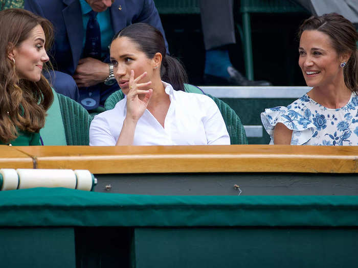 In another 2019 Wimbledon outing, Middleton and her sister Pippa appeared to engage in a lighthearted conversation with Markle.