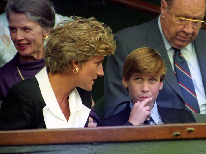 A couple of years after he was first pictured at Wimbledon, William was back at the tennis tournament gazing upwards while Diana spoke to him.