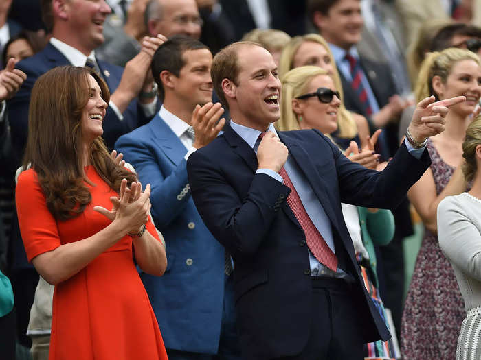 Middleton laughed and clapped while William pointed her toward something on the courts while at Wimbledon in 2015.