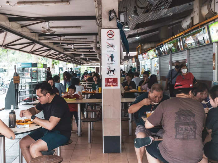 1. Choosing to eat only at big-name hawker stalls in the city center.