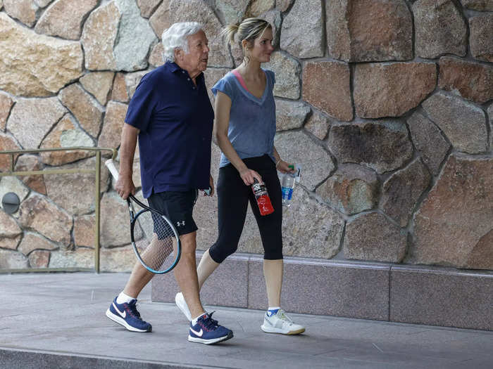 New England Patriots owner Robert Kraft and his fiancée, Dana Blumberg, return from a game of tennis.