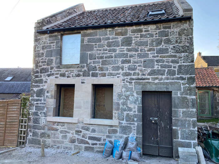 New windows were installed on the front of the house and a skylight was added to the roof.