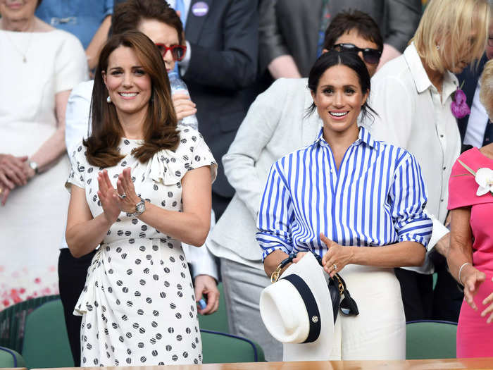 2018: The following year, Middleton embraced the Wimbledon theme by wearing a custom Jenny Packham gown with a tennis-ball print. She attended the tournament with sister-in-law Meghan Markle.