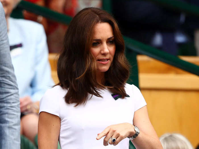 2017: The duchess looked summery in a Catherine Walker dress with capped sleeves and a floral skirt.