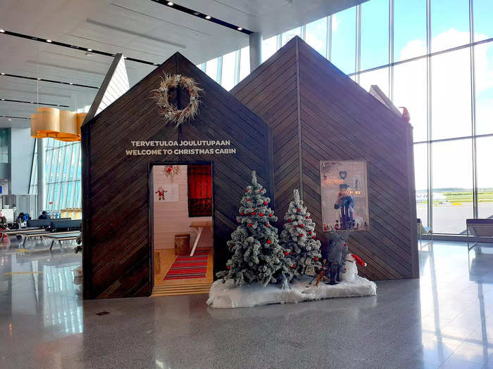 There was a Christmas cabin inside the airport.