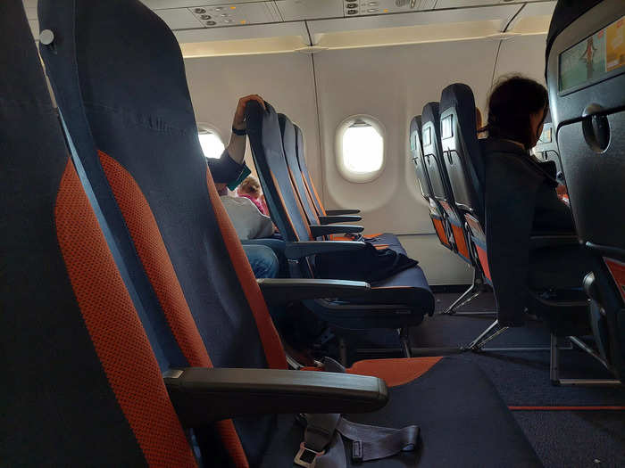 On the easyJet flight, seats are three abreast on either side of the aisle. Each seat had a fold-down table and space for luggage in the overhead lockers, although these got full quite quickly.