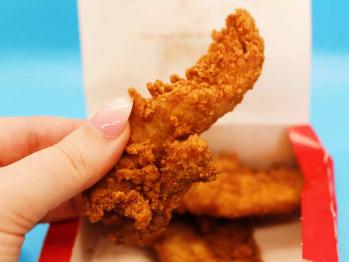 The Chick-fil-A tenders were heavily fried and darker in color than the Raising Cane