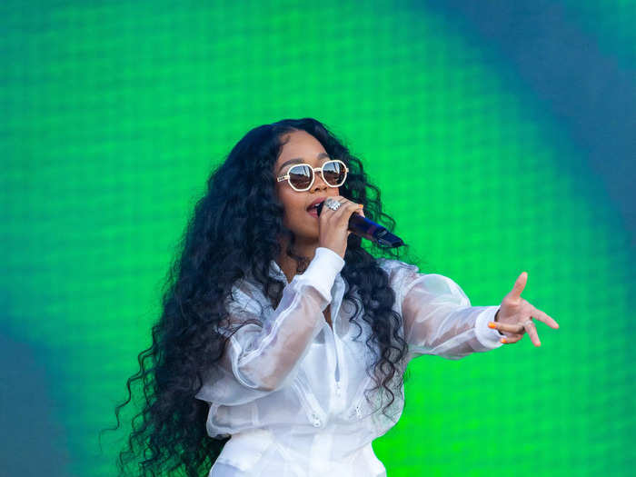 For a super cool look, H.E.R. wore a sheer, all-white jumpsuit.