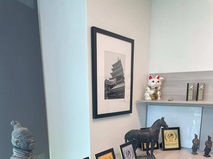 One of my favorite decorations is the red-and-white Lucky Cat on a shelf above my desk. It