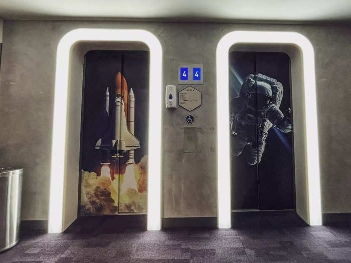 While Yotelair is known for its airplane-themed motifs, the elevators were decked out in space decals.