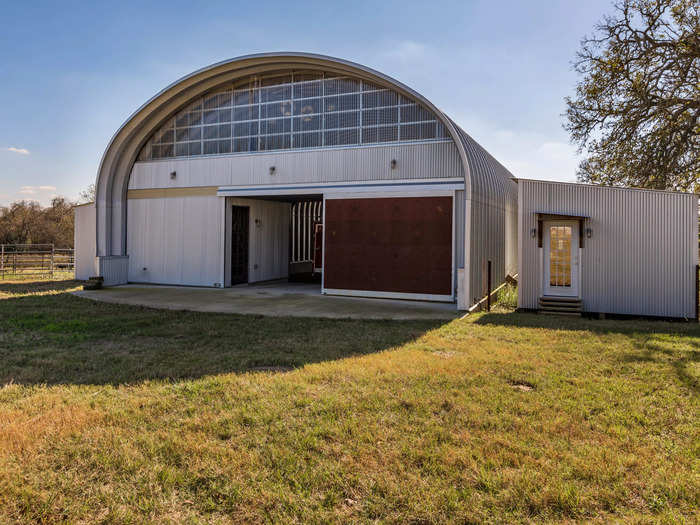 The owners also built a 4,000-square-foot Quonset-style barn to complement their main home.