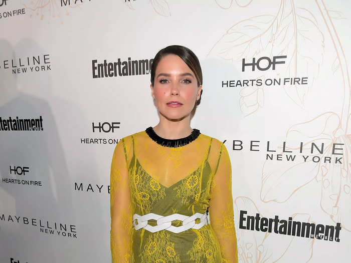 She paired a mustard-yellow sheer dress with a black slip and a chunky white belt at a January 2018 SAG Awards event.