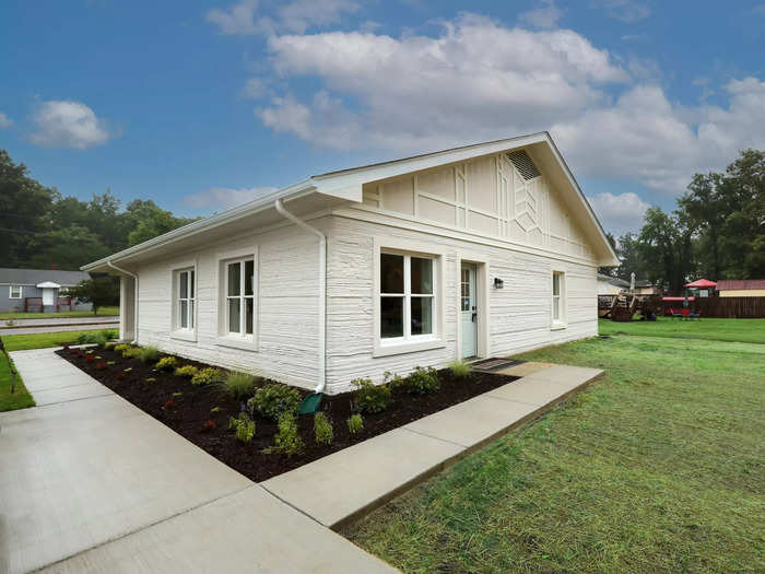 The off-white house is the first 3D-printed home in the city, according to Virginia Housing …