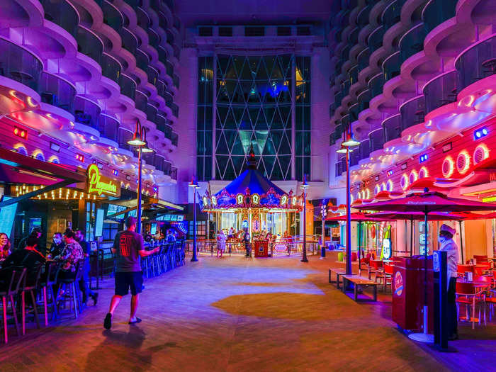 On my cruise ship, Johnny Rockets was on the Boardwalk — an outdoor section of deck six that feels like a carnival with a carousel, games, and colorful lights.