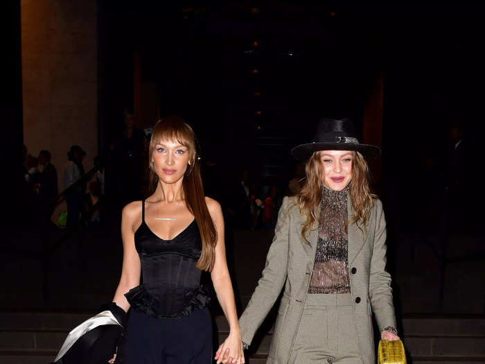 The Hadid sisters both put a sexy spin on suits for Marc Jacobs