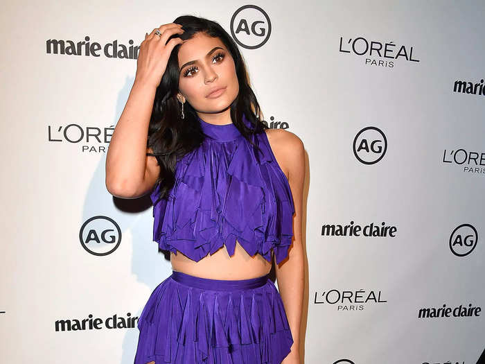 Kylie Jenner attended the Marie Claire Image Maker Awards 2017 in a purple frilly dress with thigh cutouts.