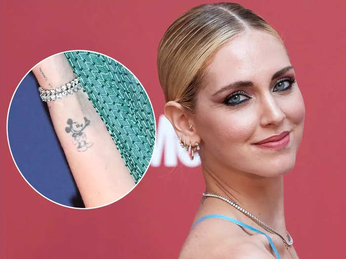 Italian influencer Chiara Ferragni has a portrait of Mickey Mouse taking a selfie inked on her wrist.