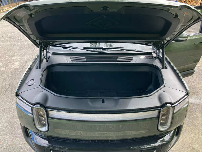 Rivian packed the R1S with bonus storage space. If you run out of space in the back, you can always put some bags in the frunk.