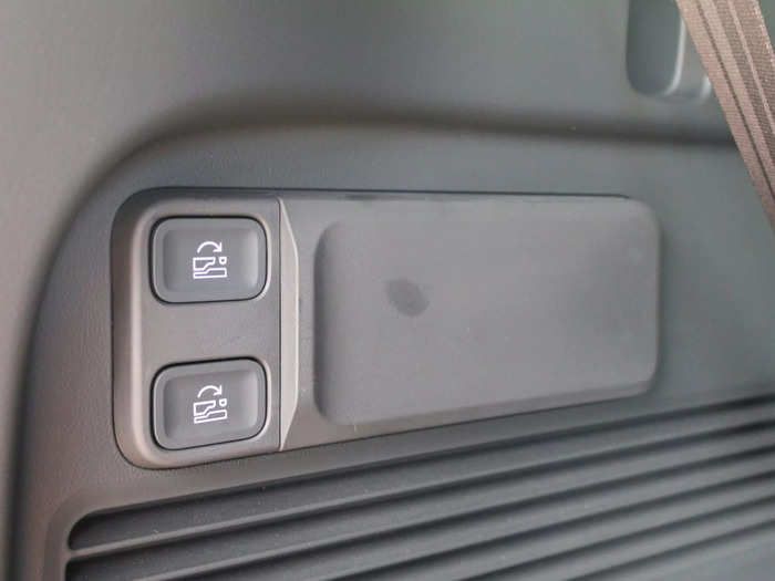 Standing behind the SUV, you can open up more space by collapsing one or both rows of seats using two buttons.