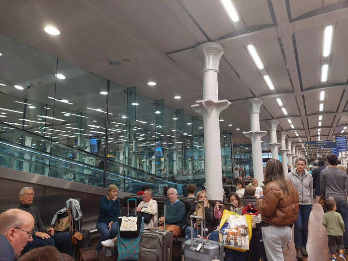 The waiting area was busy – it seemed that a lot of people planned to travel that day, and the room was littered with suitcases too. About 20 minutes before our train to Amsterdam was due to leave, the screens updated and said we could start boarding.