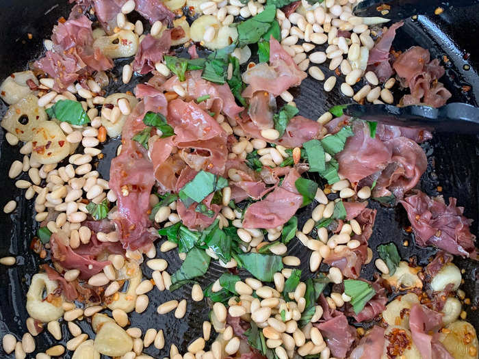 At this point, I popped the pine nuts and basil into the pan and loved how colorful it looked. The smell of all the ingredients blending together was very appealing.