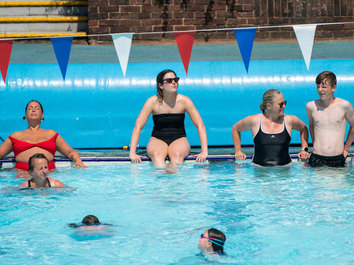 Outdoor pools across the country drew over-heated Brits seeking a cool dip.