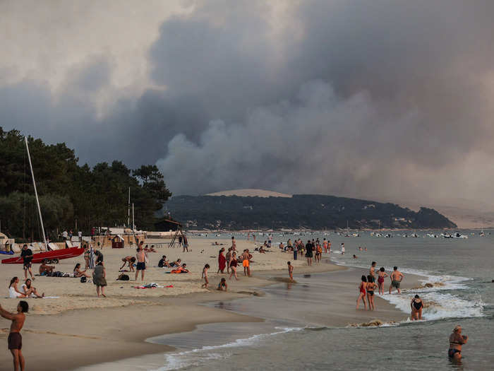 But wildfires across France darkened some beachgoers