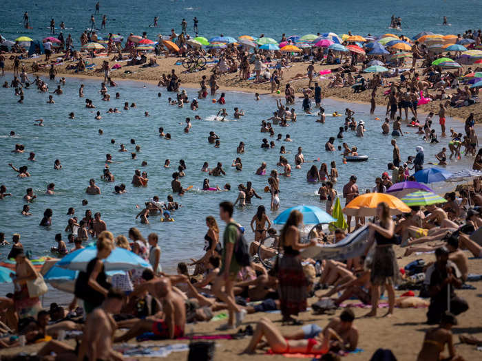 People in Spain flocked to open waters over the weekend to keep cool.