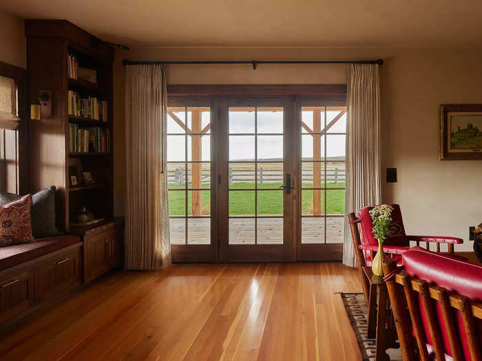 Large windows and french doors let in plenty of natural light.