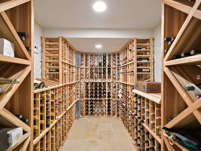 The basement has an 800-bottle wine cellar and a laundry room.