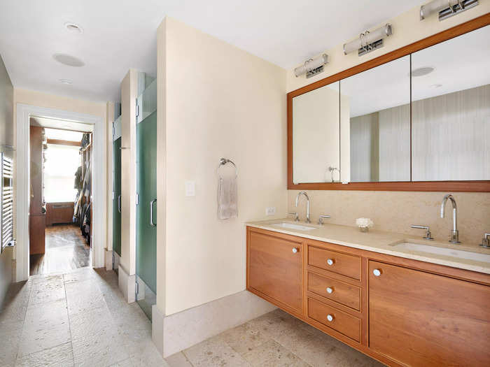The primary bathroom is a dream with heated flooring and double vanities.