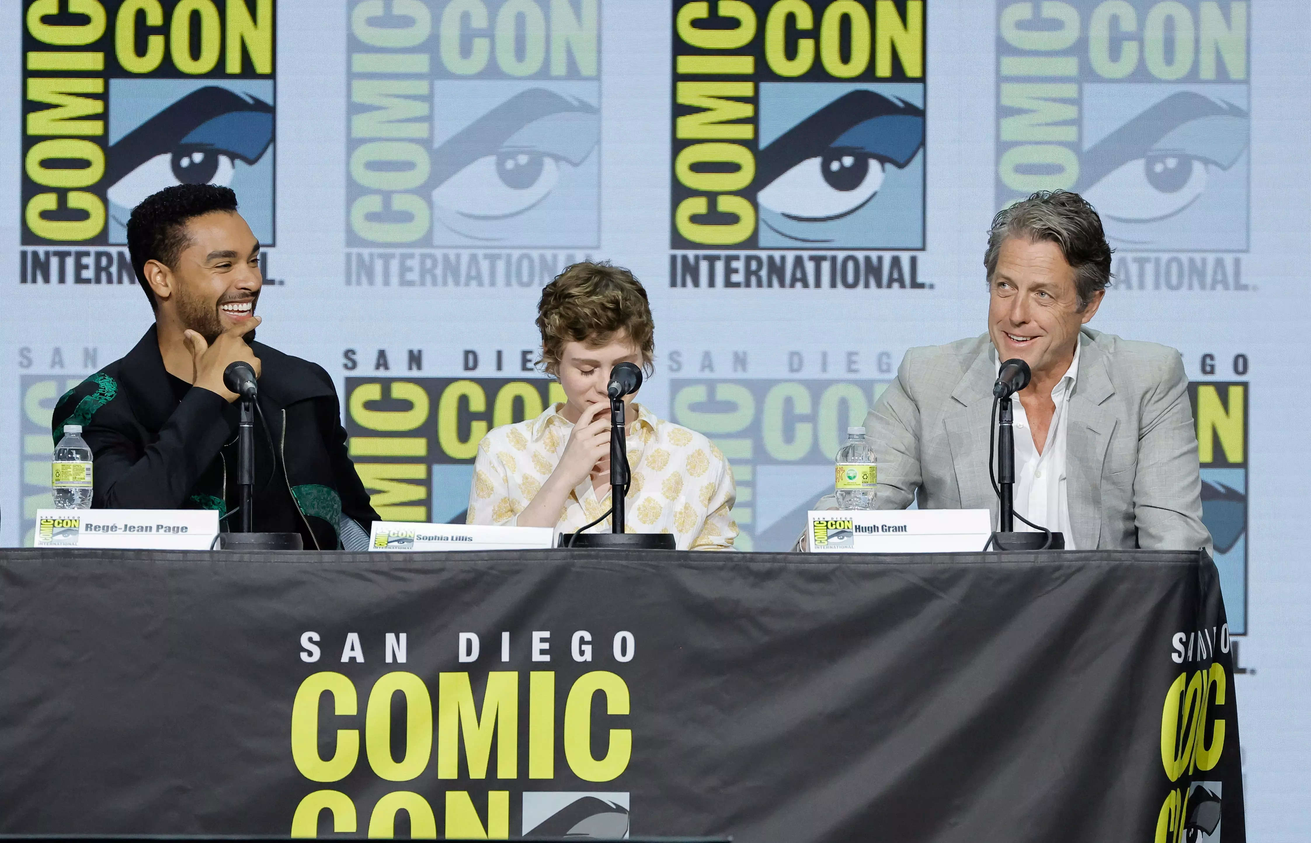 (L-R) Regé-Jean Page, Sophia Lillis, and Hugh Grant speak onstage at the "Dungeons & Dragons: Honor Among Thieves" panel during 2022 Comic-Con International: San Diego at San Diego Convention Center on July 21, 2022 in San Diego, California.