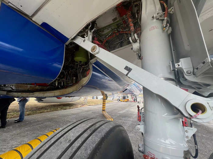 According to the engineer, the gear expands for takeoff but can compress to make the jet sit lower at airport gates, negating the need for new infrastructure.