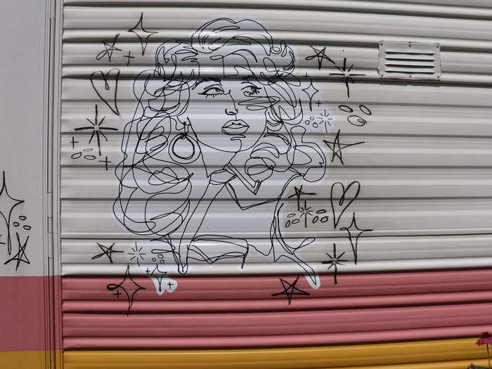 They commissioned tattoo artist Mira Mariah to create a mural of Dolly Parton to adorn the exterior.