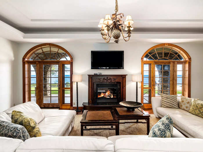 There are fireplaces throughout the house and every room seemingly has a view of the ocean.