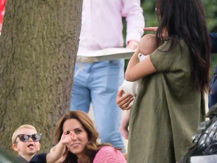 Louis pulled a funny face while wearing a pair of adult glasses on a day out with his mother as well as Meghan Markle and Archie Mountbatten-Windsor.